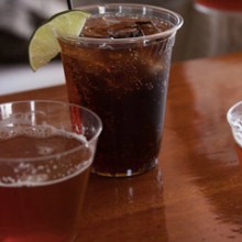 a glass of beer on a table