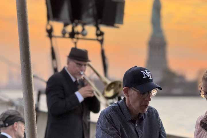 a man sitting on a motorcycle