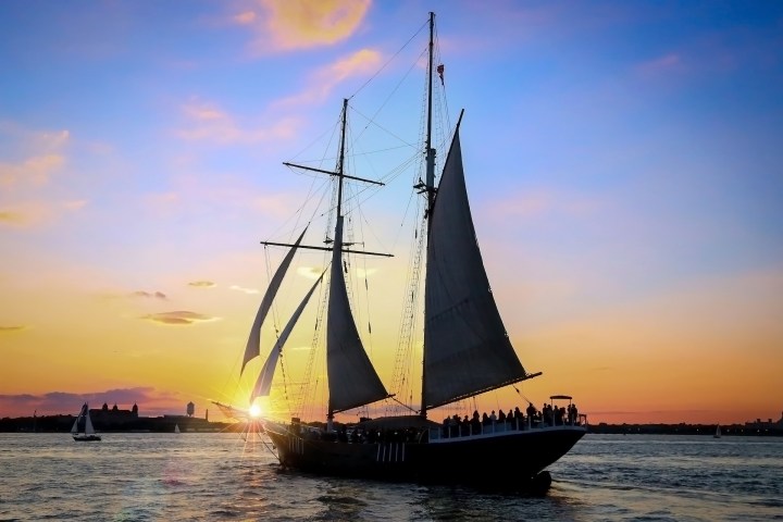 a boat sitting on top of a body of water