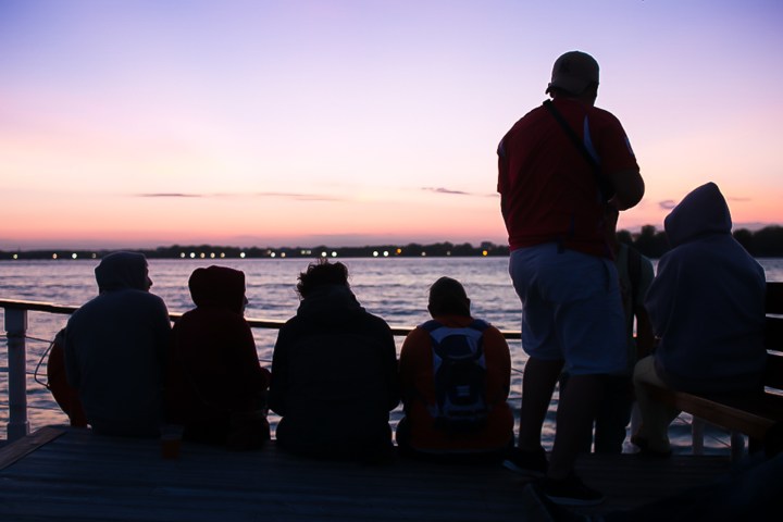 a man sitting at a beach