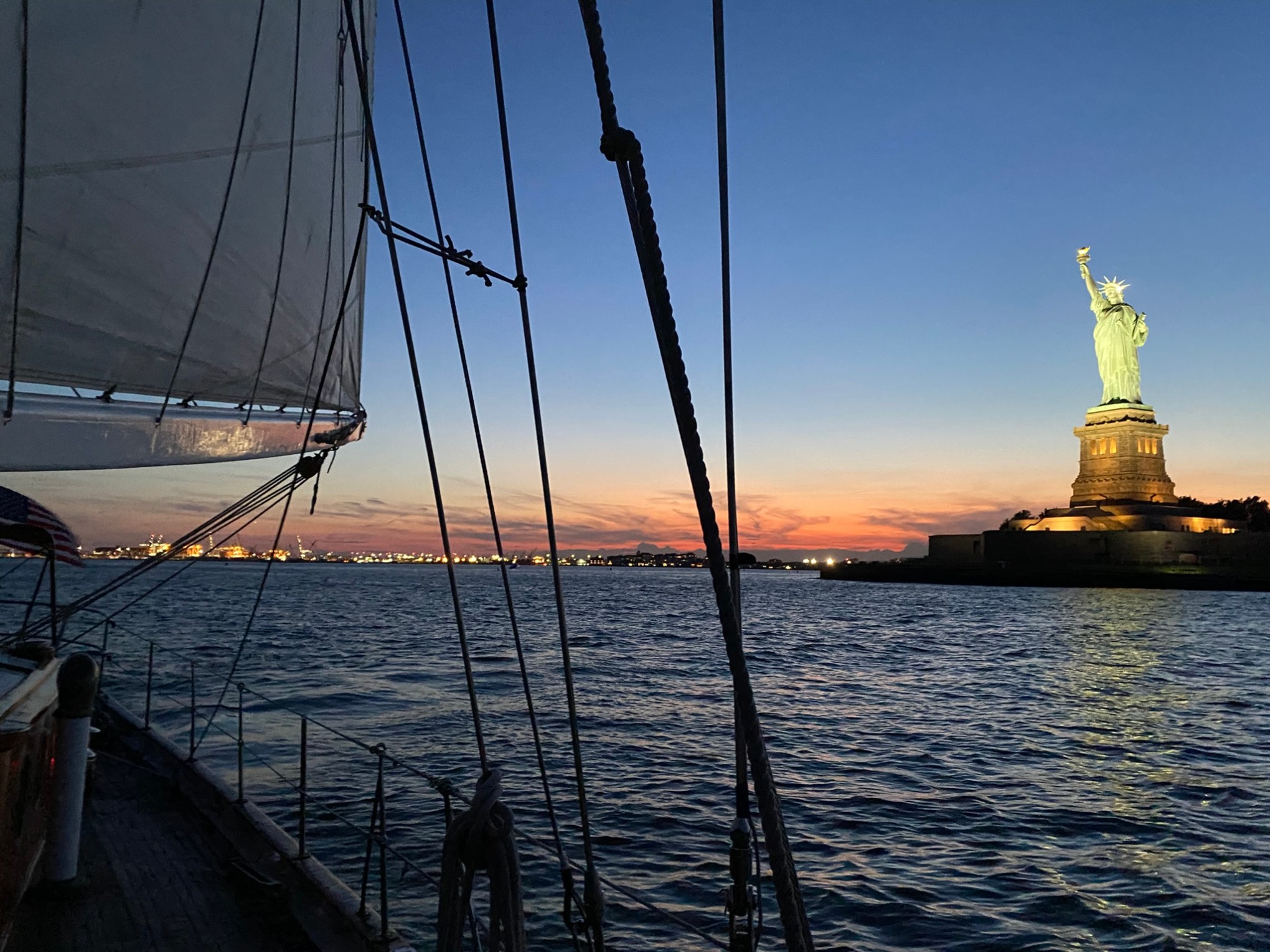 a boat is docked next to a body of water